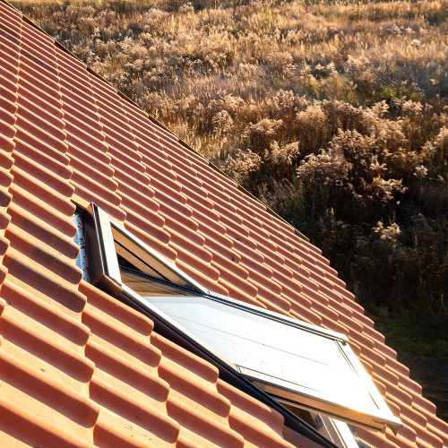 Couvreur sur toiture à Touques